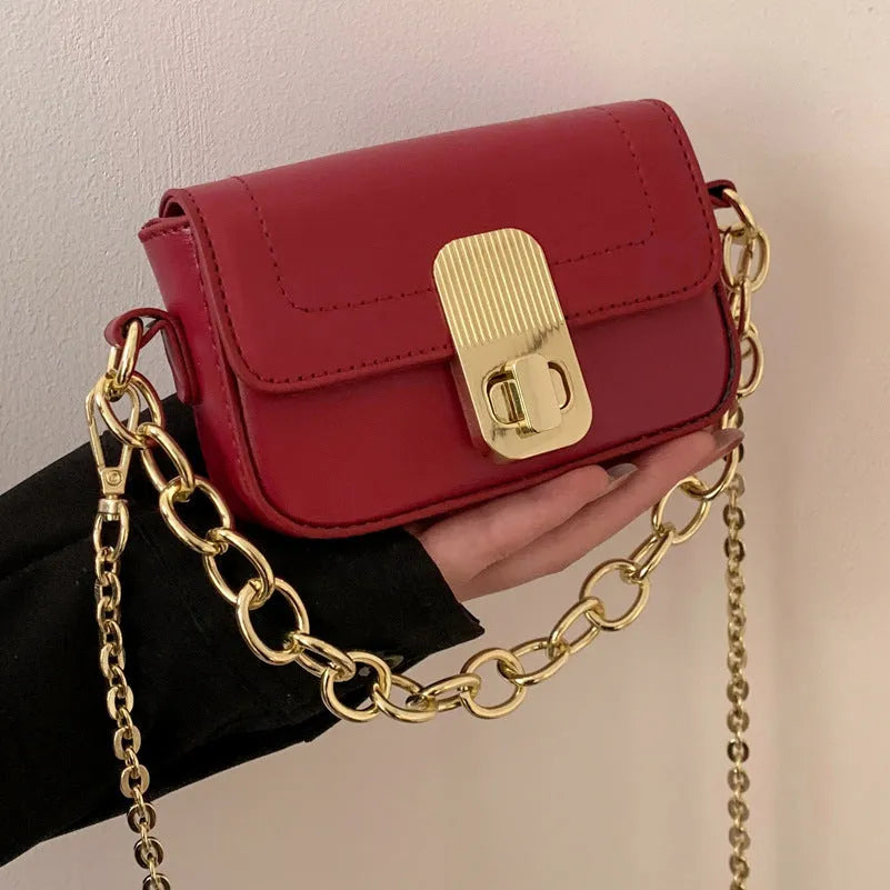 Niche chain shoulder messenger phone bag in horizontal square PU with soft handle and lock detail, brown colour option