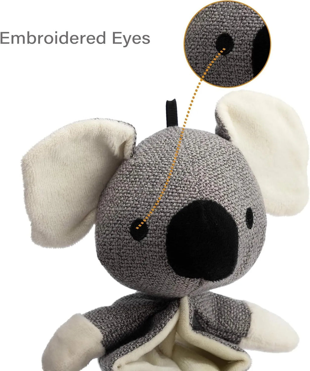 Grey koala plush dog toy measuring 30cm long with visible stitching and soft limbs.