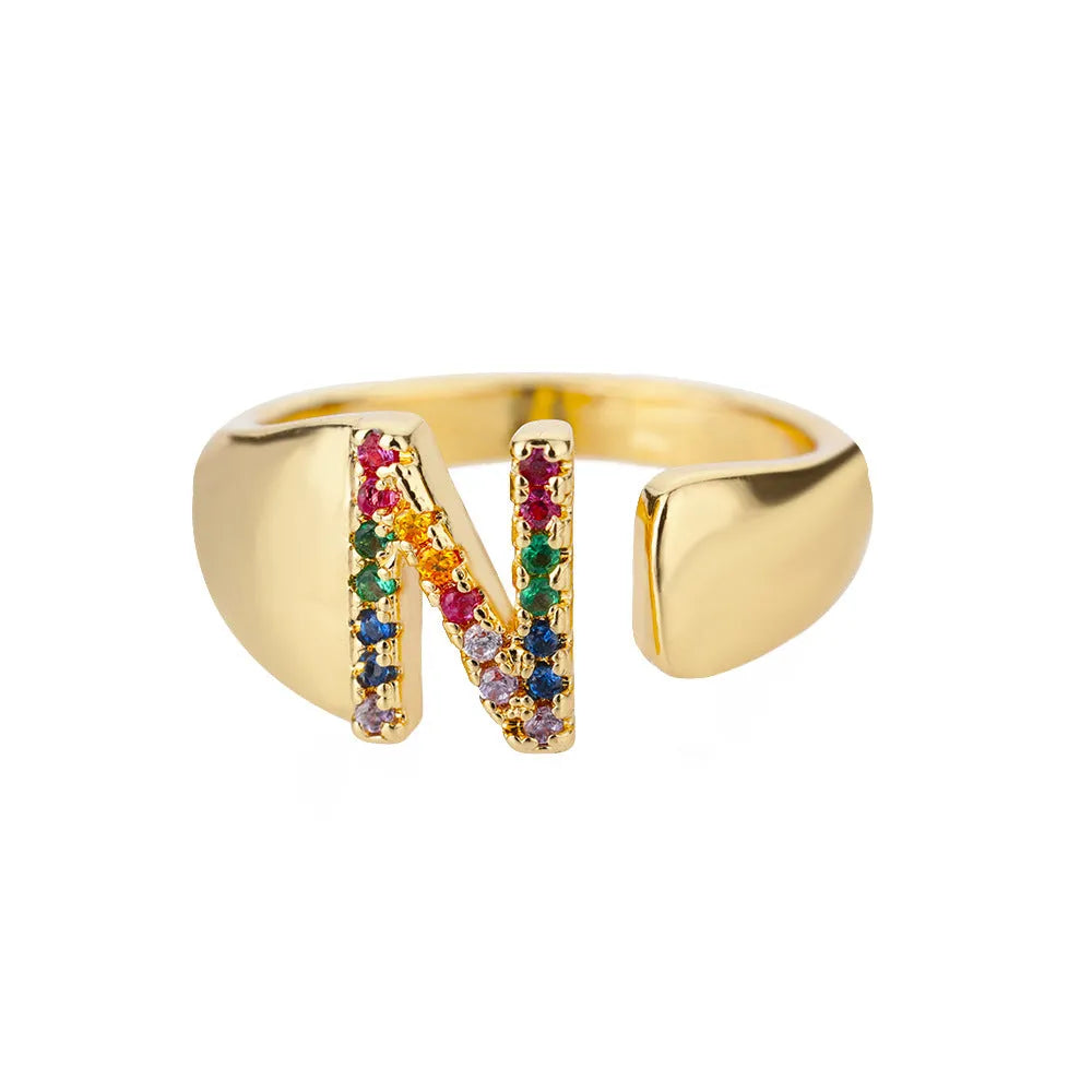 Fashion micro-set colored zirconium adjustable open ring showing letter A on a copper electroplated base