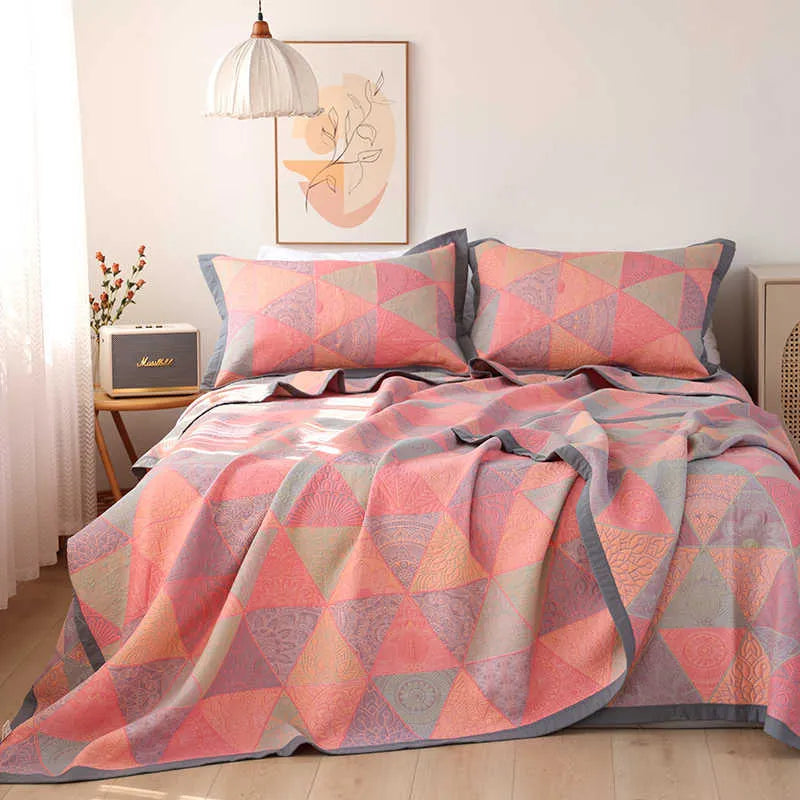 Cotton gauze bed blanket set with plant and flower pattern showing blanket and two pillowcases