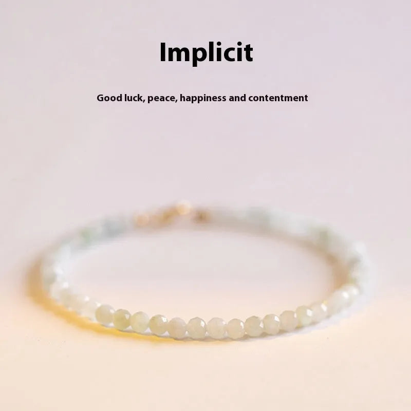 Women's Korean style retro jade bracelet in ball type design on a wrist.