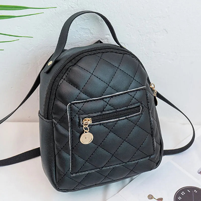 Hard white Korean style embroidered girls backpack showing sandwich pocket and soft carry handle.