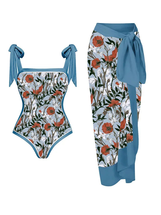 Women's two-piece floral printed polyester swimsuit with matching hip skirt in conservative style