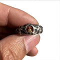 Hand-forged copper Buddha ring with grotto rock texture, shown in size 8.