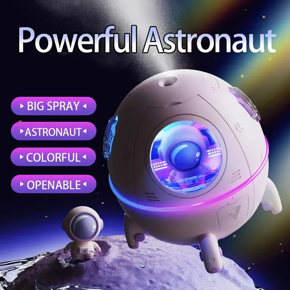 Light purple astronaut-themed USB humidifier with colourful LED lights on desktop