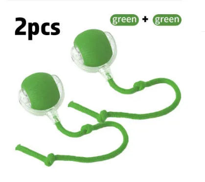Flexible silicone rolling ball cat toy in plush red, green, and grey colours