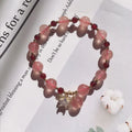Handmade strawberry quartz crystal bracelet for women showing five natural stone design variations