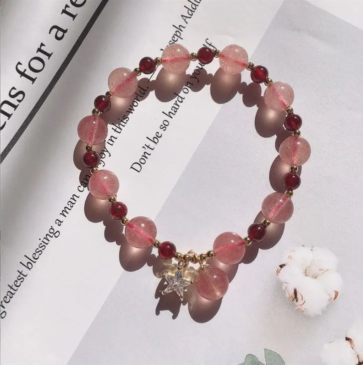 Handmade strawberry quartz crystal bracelet for women showing five natural stone design variations