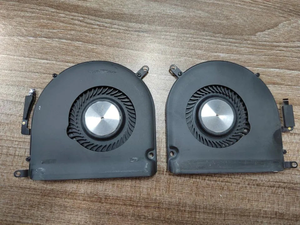 A1398 MacBook Pro internal laptop cooling fan replacement component on a paper box.