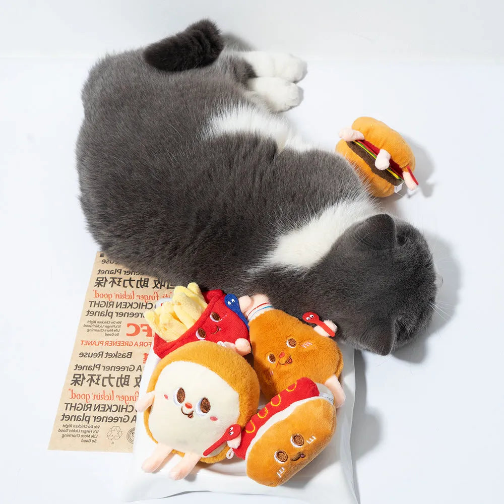 Set of five soft cat toys shaped like hamburger, chicken leg, fries, bread, and hot dog on a white background