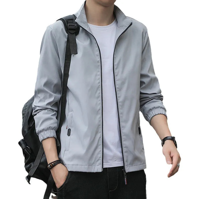 Korean style loose lapel autumn jacket for men in black with zipper pockets
