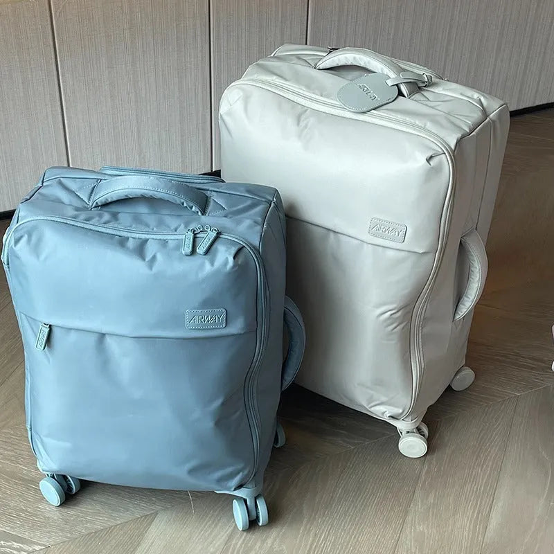 Ultra-light waterproof Oxford cloth suitcase with universal wheels in bluestone green colour