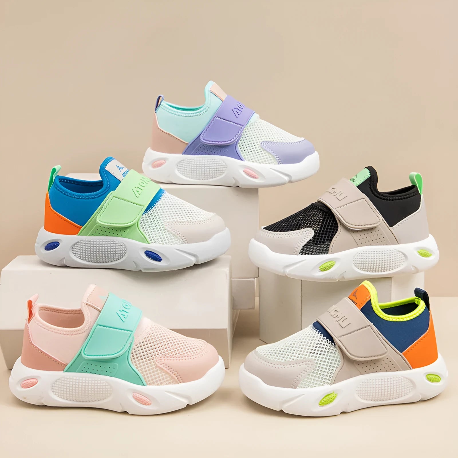 Children's slip-on shoes with soft rubber sole and PU upper in blue green colour on white background