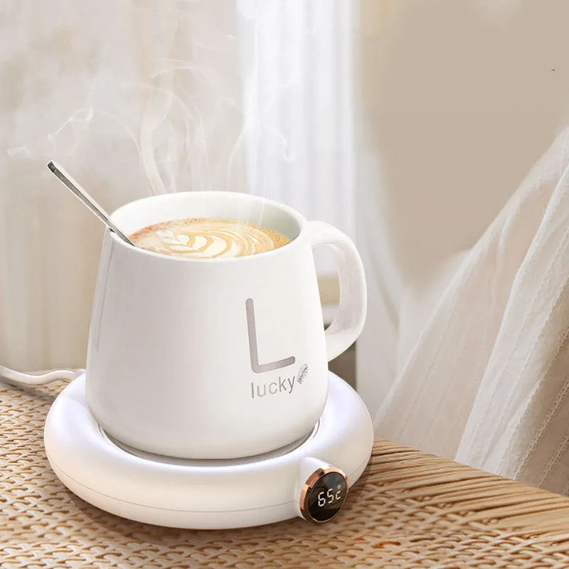 USB coffee mug warmer coaster in white on a desk, with a mug of coffee on top, 130x110x23mm, 10W constant temperature heating pad
