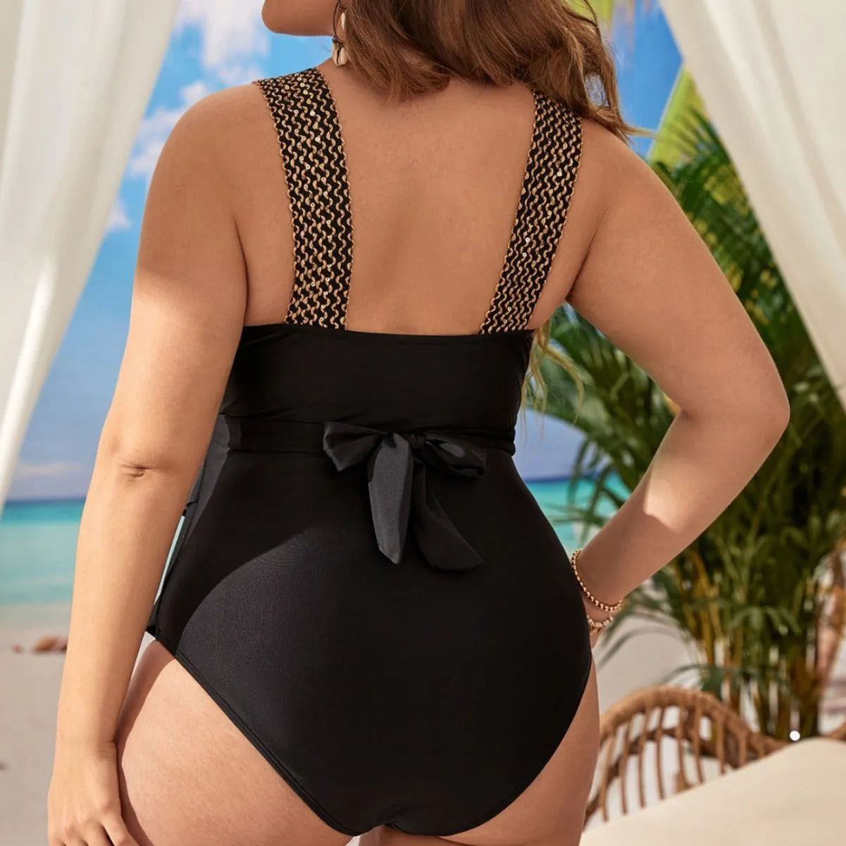 Women's black one-piece swimsuit with chest pad, sleeveless design for swimming and fitness