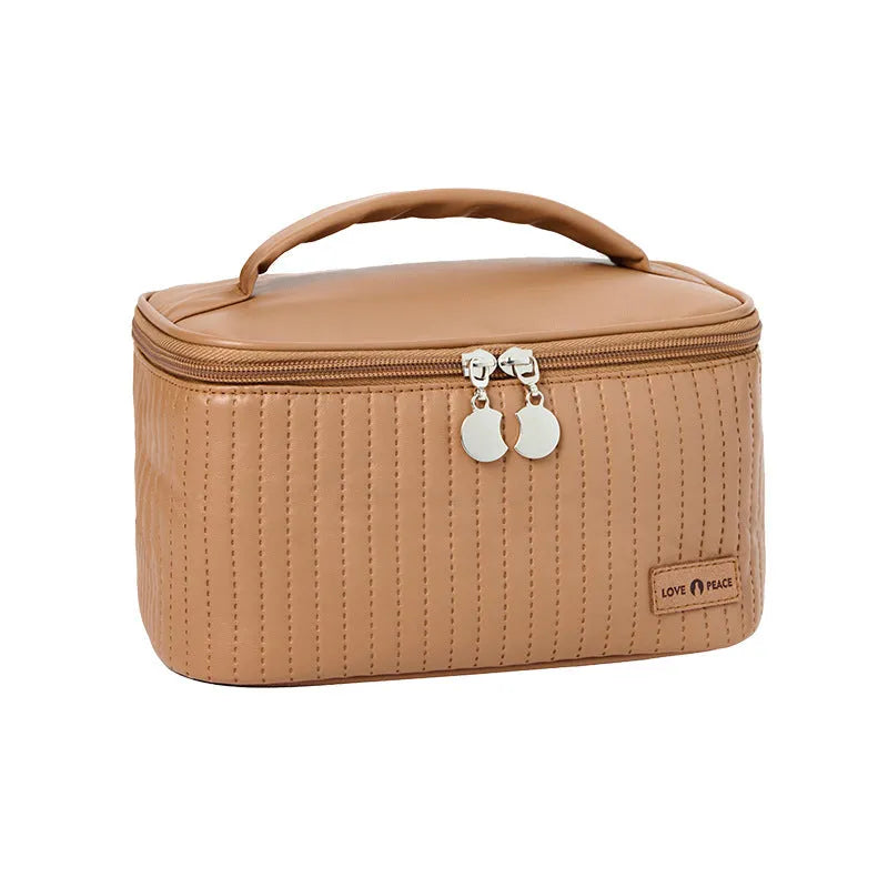 Open-top solid colour PU leather makeup bag in a choice of six colours.