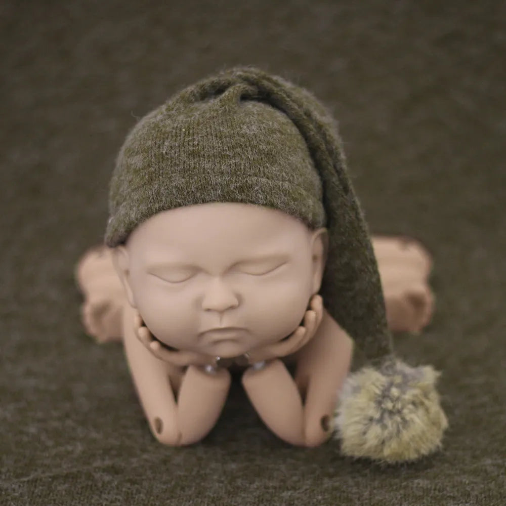 Hand-woven yarn baby photography hat in conical style, available in twelve colour options