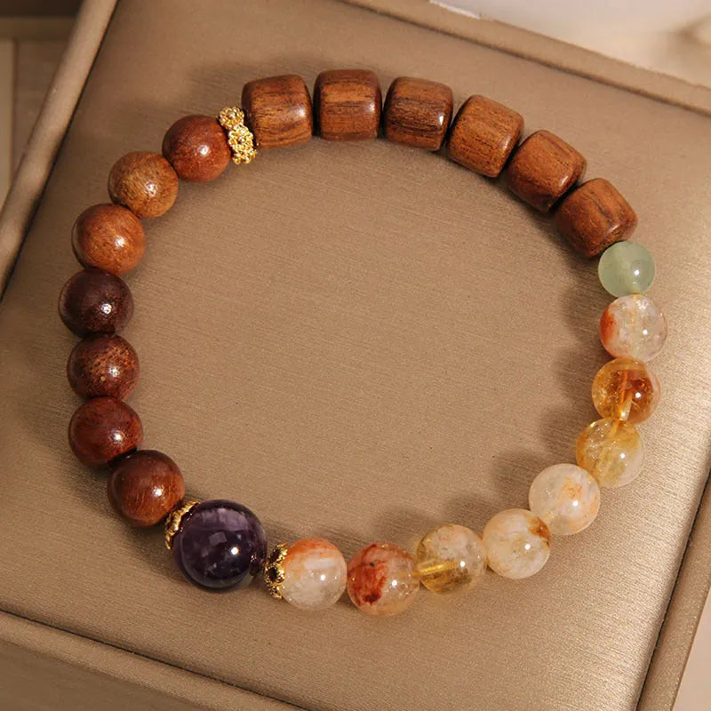 Yellow crystal amethyst bracelet with pearl and rhinestone decorative elements