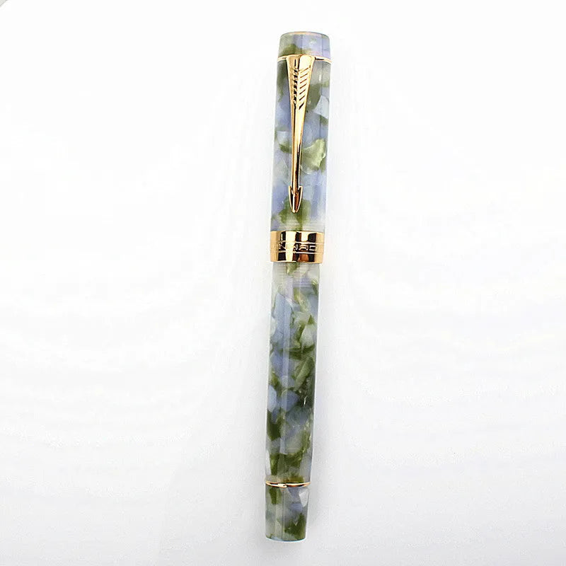Deep bath green metal pen showing fine, medium, and graphic art tip options
