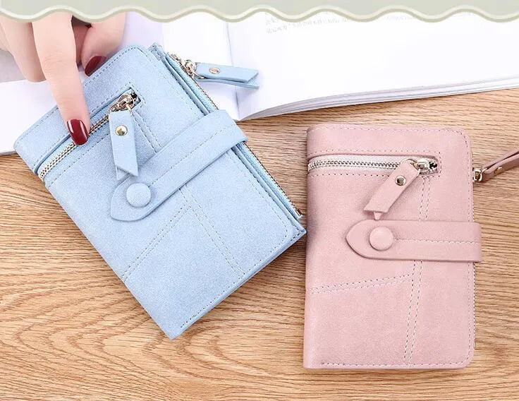 Faux leather standard short wallet with zipper closure, solid colour, showing multiple internal compartments