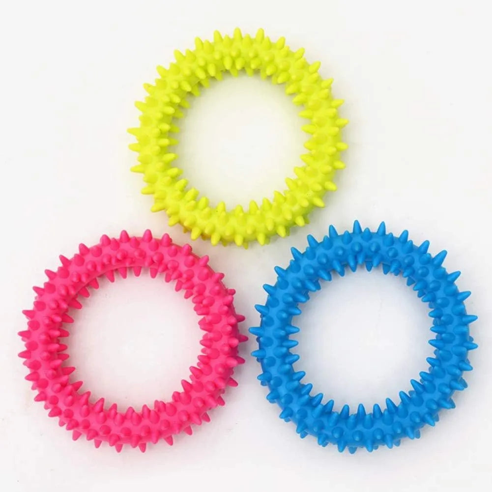 Blue spiked circle ring dog chew toy made from TPR for dental cleaning and bite training.