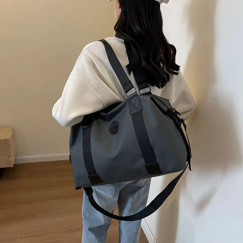 Large waterproof Oxford cloth travel backpack in black with dry wet separation compartments
