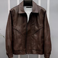 Men's waterproof PU leather lapel jacket in black with loose fit and drawstring sleeves