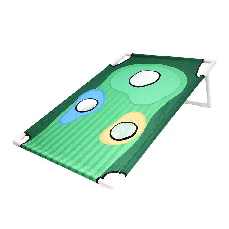 Green 90x60cm golf swing practice net with PVC frame and oxford cloth cover on grass, with straw mat and balls