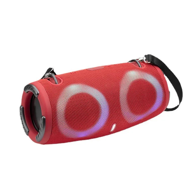 War Drum portable Bluetooth speaker with RGB coloured lights in outdoor setting