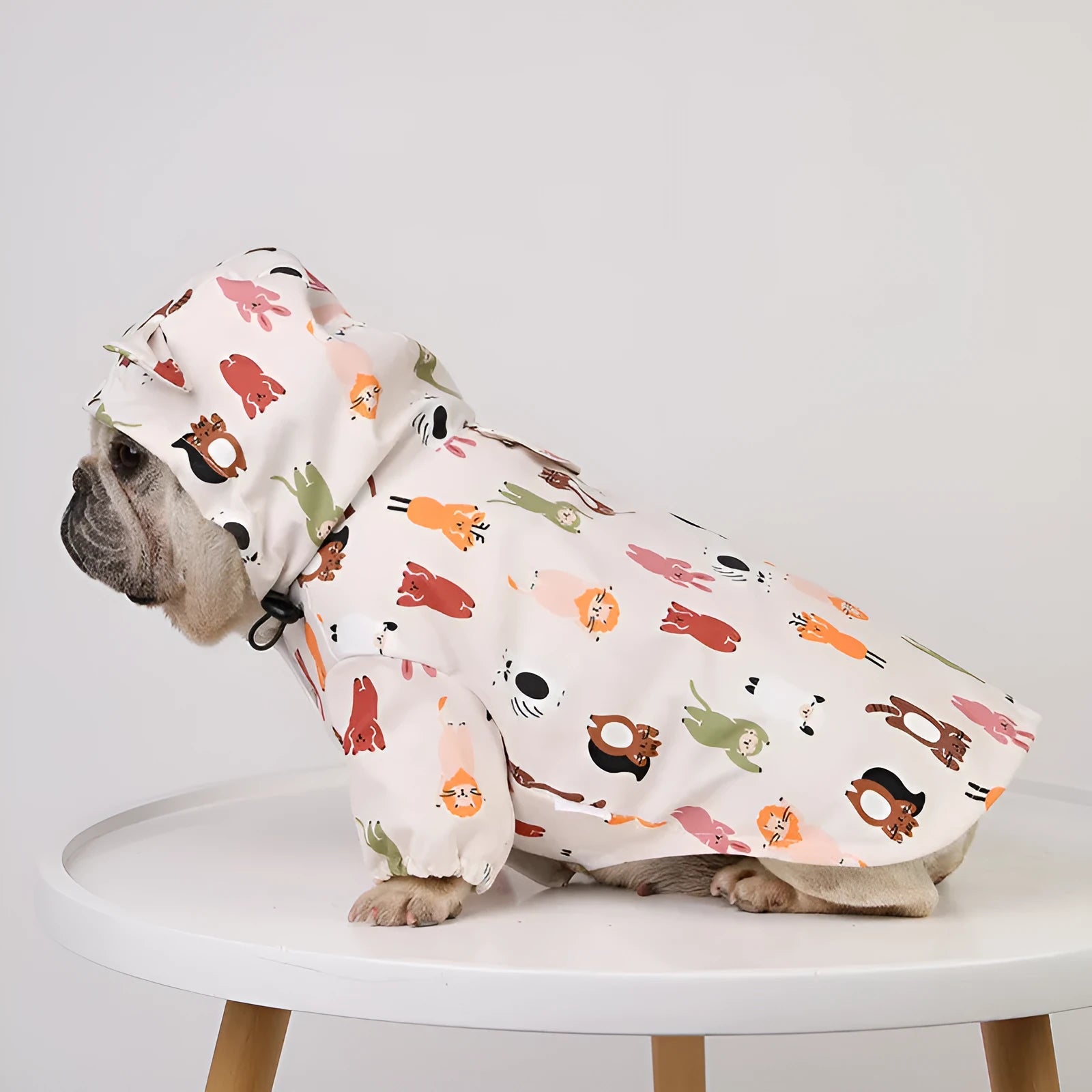 Beige dog raincoat with cartoon animal pattern waterproof PU material