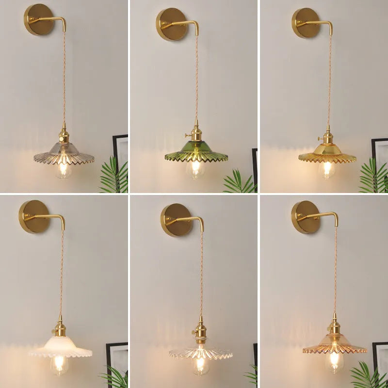 Retro brass lotus wall lamp with a glass shade in a choice of six colours.