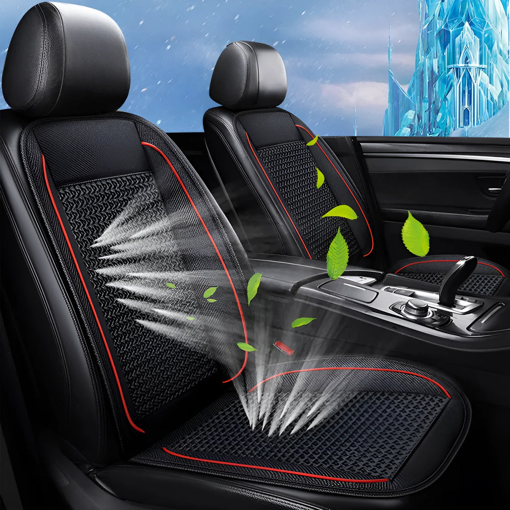 Square black car seat ventilation cushion with power cord, shown on a car seat.