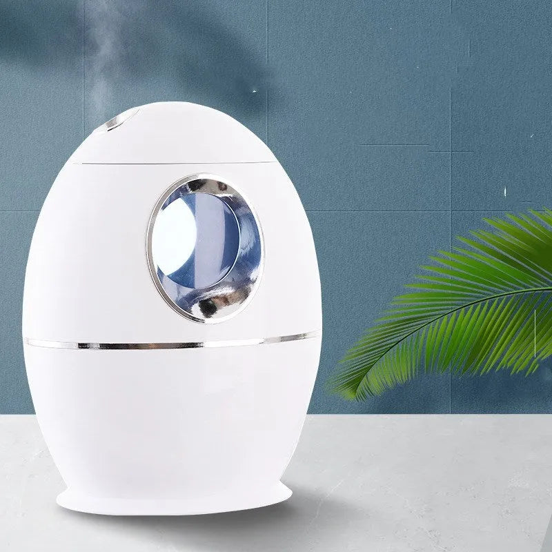 White columnar household humidifier with anion air disinfection function and USB cable.