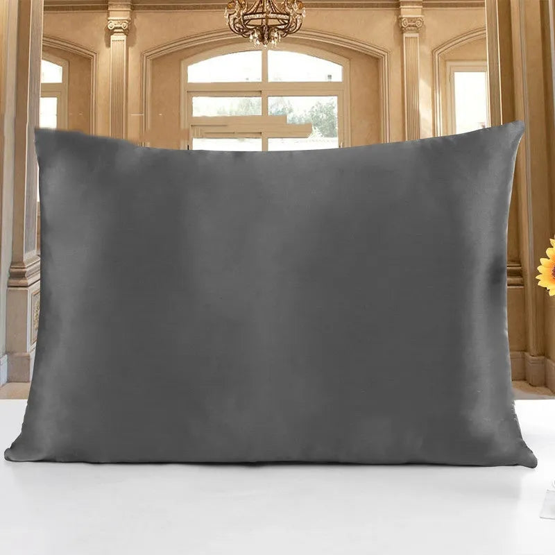 Double-sided 19 M silk pillowcase in apricot colour, showing reversible construction and standard UK size.