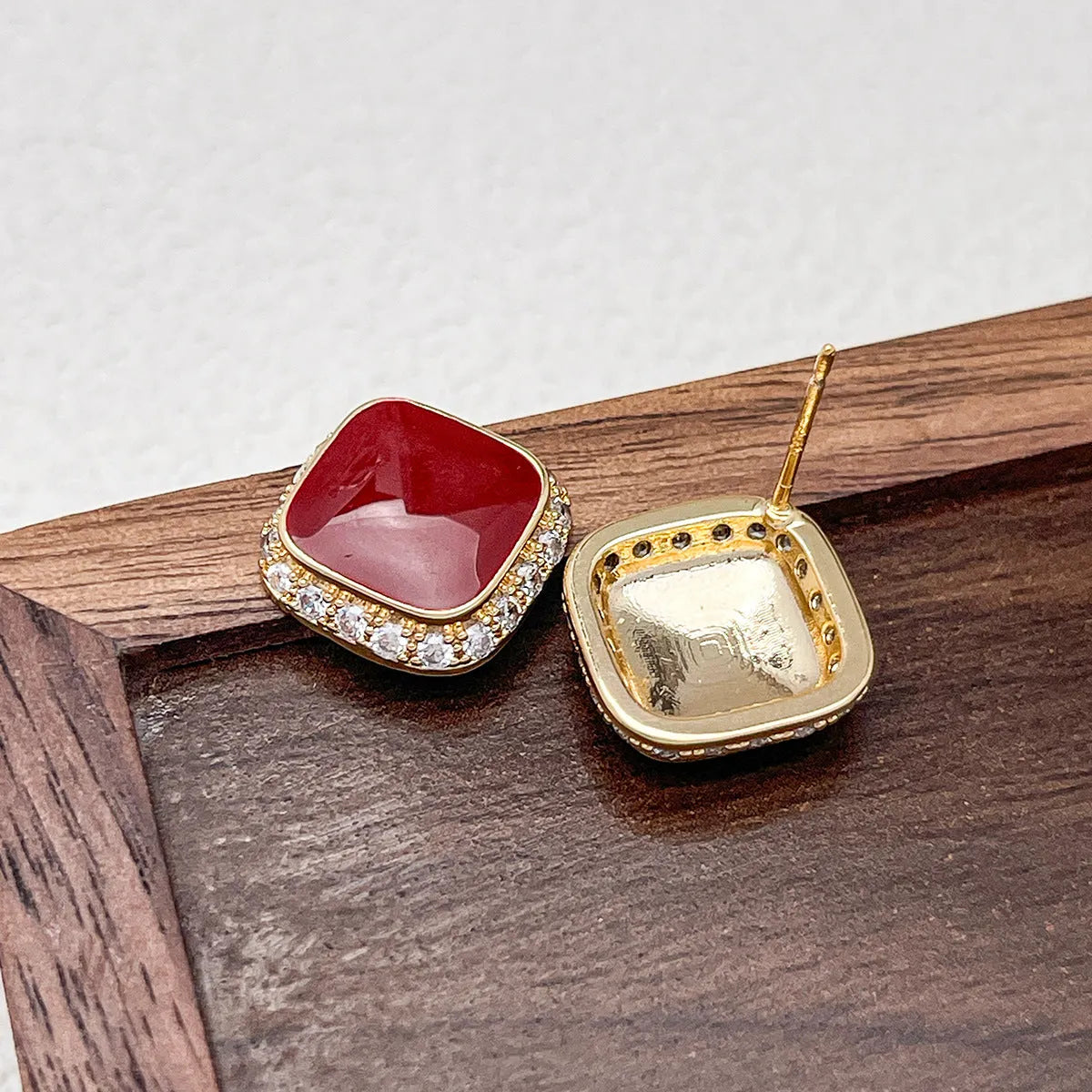 Red geometric square plate earrings with retro style and inlaid detailing