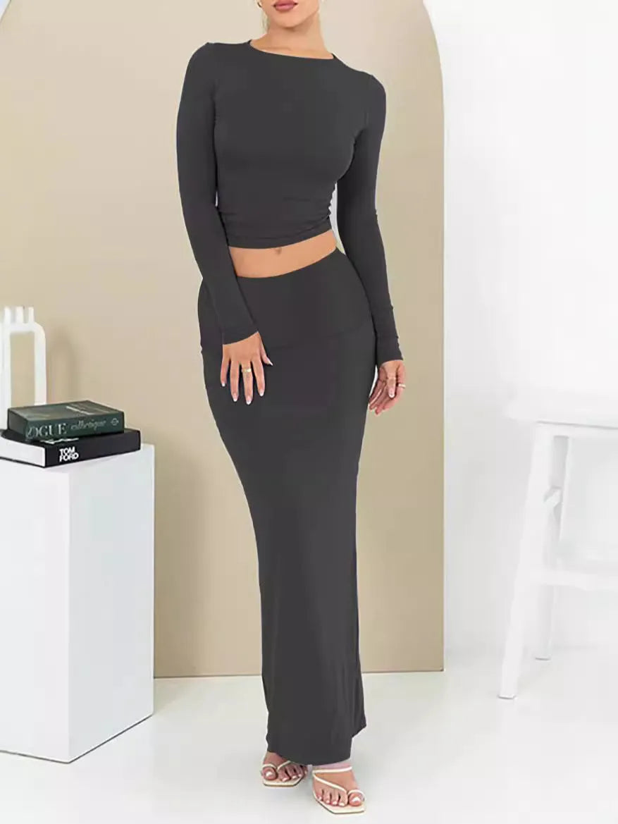Women's autumn two-piece suit in polyester with long skirt and three-quarter sleeves in sweet style