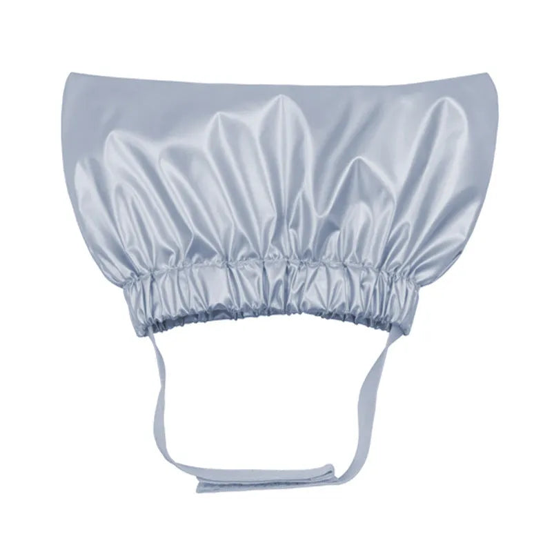Adjustable pet shower cap for dogs and cats in waterproof non-woven fabric with three colour options