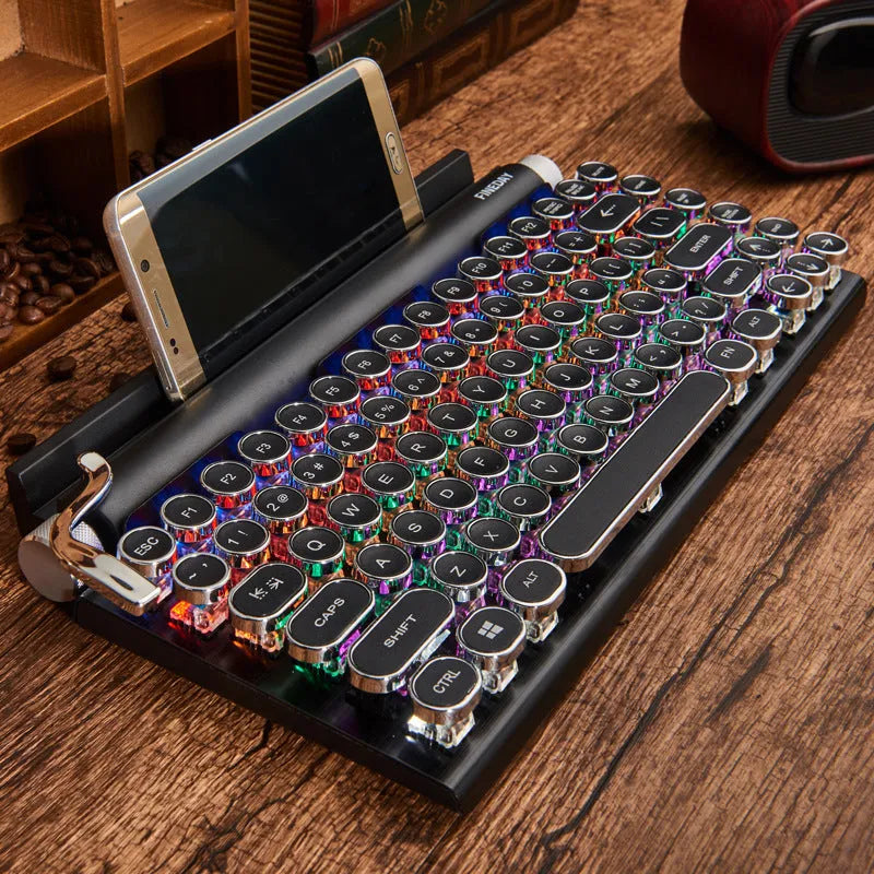 Black Dot retro typewriter style Bluetooth mechanical keyboard with colourful backlighting.