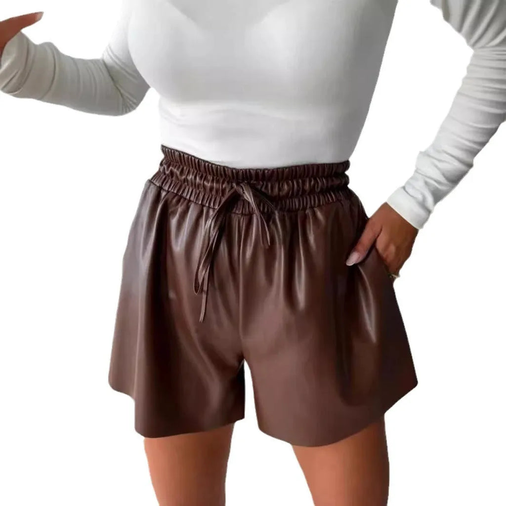 Women's black and khaki wide leg shorts with PU leather panels and lace up detailing, mid-waist drawstring closure