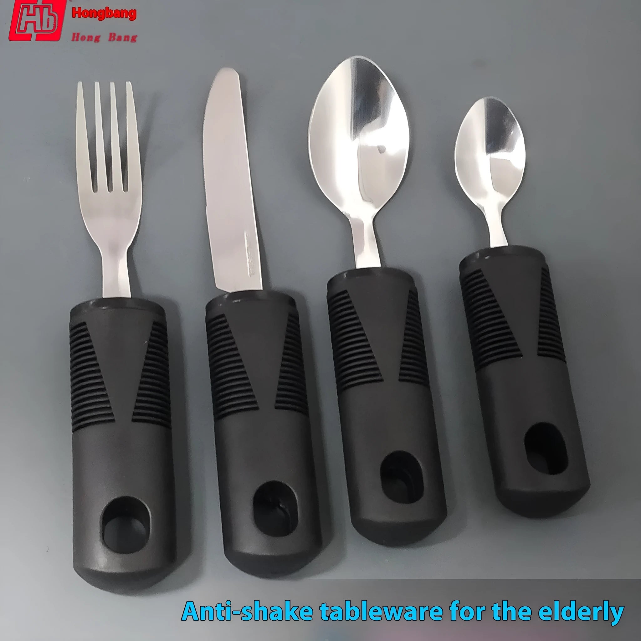 Adaptive cutlery set with stainless steel utensils and rubber grip handles for hand tremor assistance