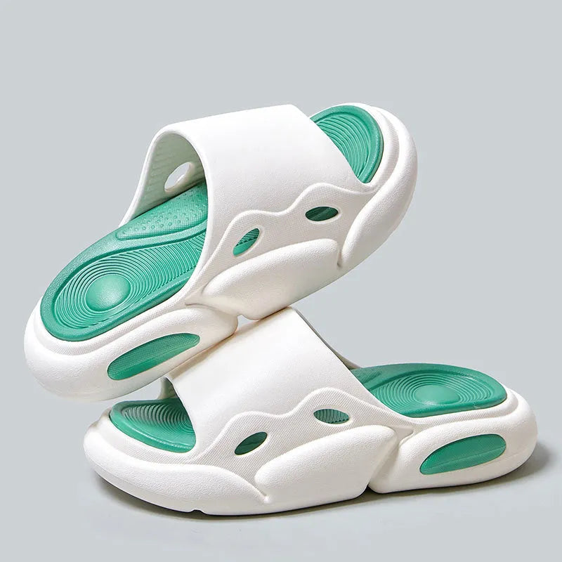 Two-colour couple slippers with thick EVA soles in black and white design