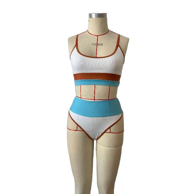 Women's solid colour two-piece bikini swimwear set with a top and shorts on a neutral background.