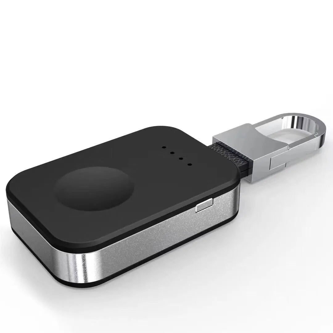 Black keychain-sized portable power bank for wireless Apple Watch charging