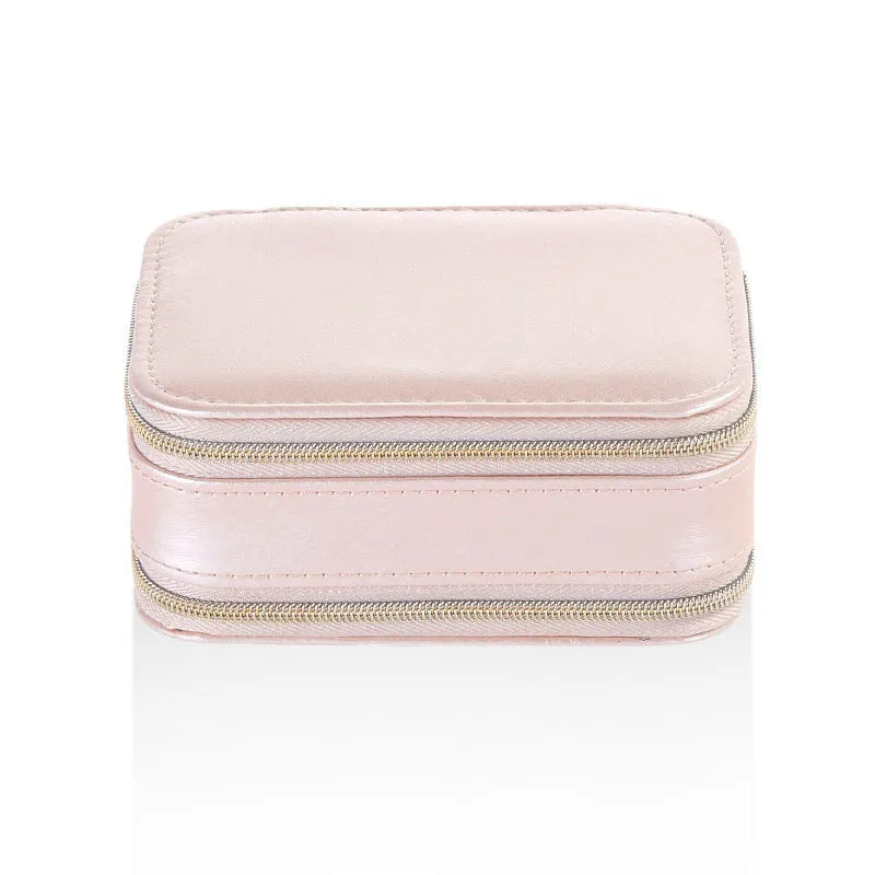 Simple zipper jewellery box in pink made from soft PU material with compact 11.5x8.5x5cm size