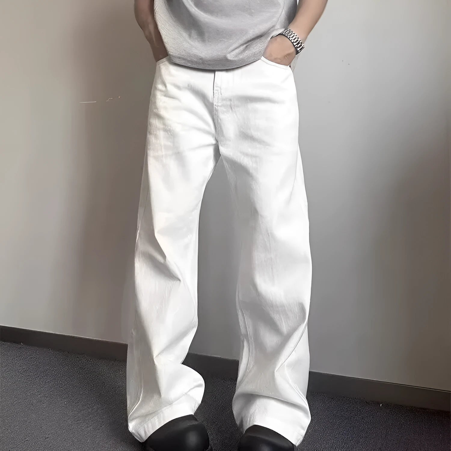 Men's white straight leg jeans with loose fit and mid waist design