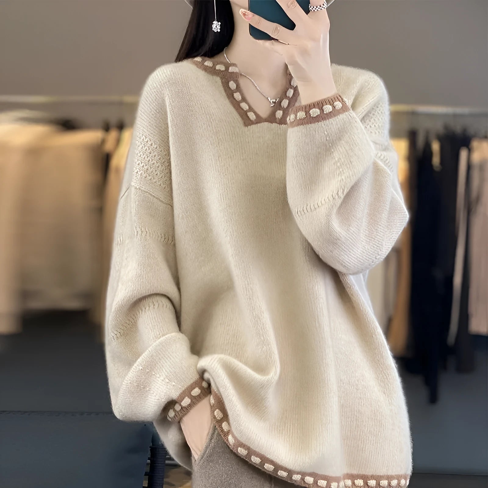 Women's white V-neck pullover sweater with long sleeves made from viscose fibre