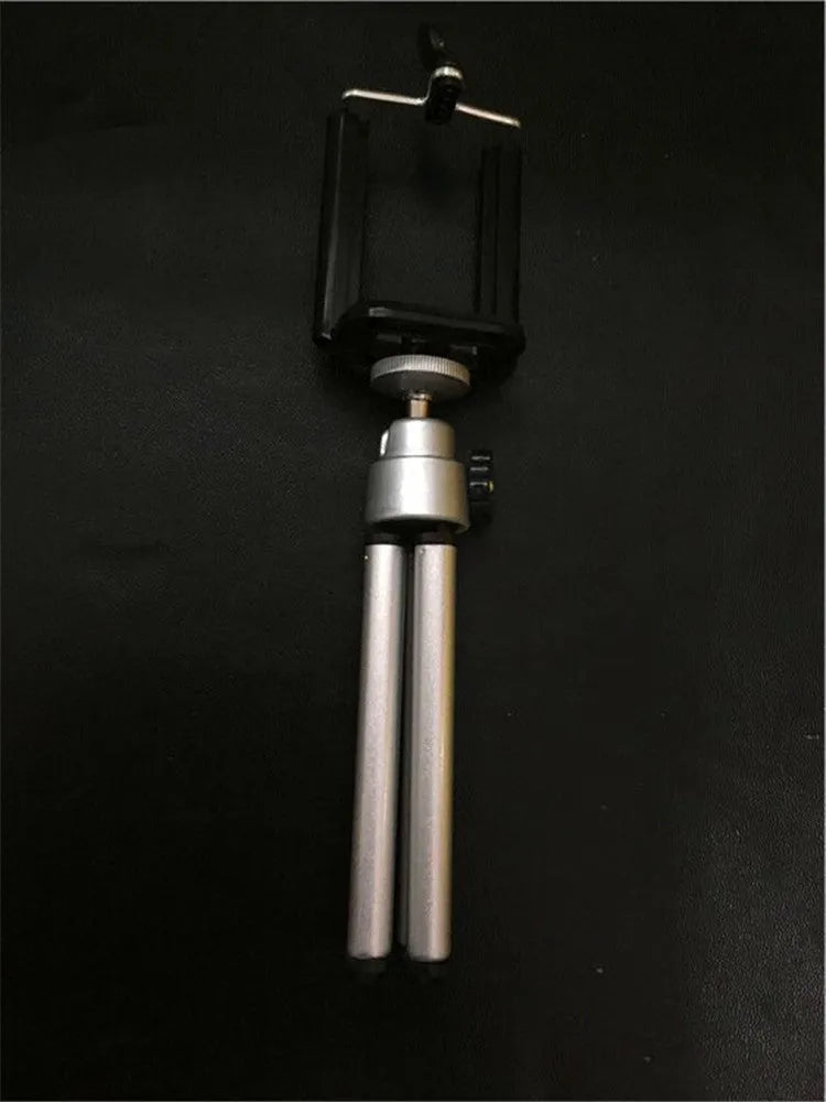 Desktop phone holder with two-section bracket in black and silver colour options