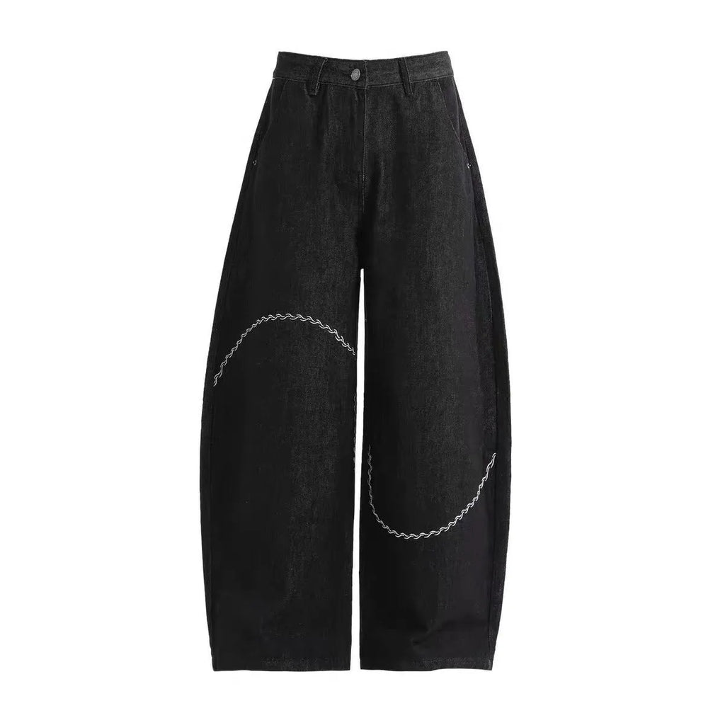 Black straight-leg polyester denim trousers on a hanger, showing mid-waist fit and zip fly.