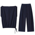 Women's two-piece co-ord set with flounced sleeve shirt top and wide leg trousers