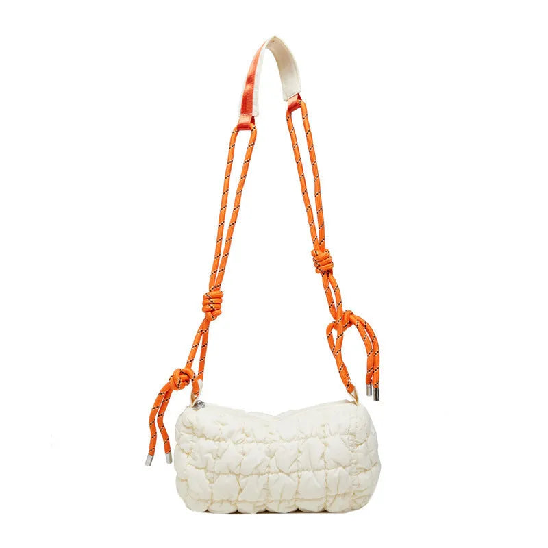 Women's lightweight nylon messenger bag in clouds print design with pillow shape and crossbody strap